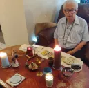 Samuel G. Abrams with tools for readings displayed