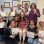 Look what they're holding along with their certificates!