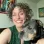 Makael smiling with her dog, Kai