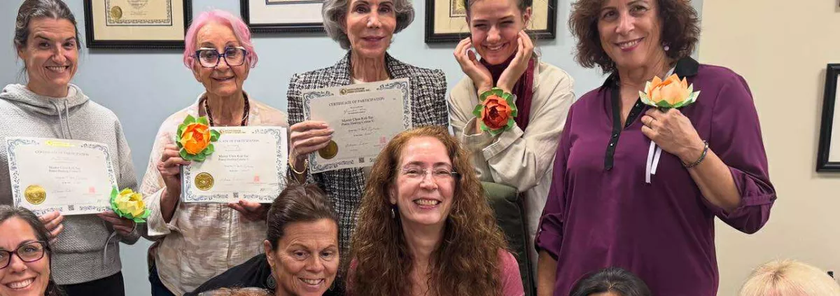 Look what they're holding along with their certificates!